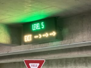 LED arrow sign directing drivers to the Level 5 exit in the Memphis International Airport garage