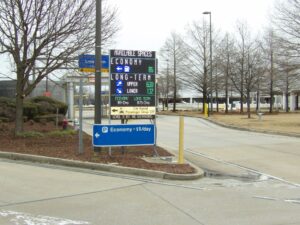 Pole-mounted LED parking availability sign at the economy lot entrance of Memphis International Airport
