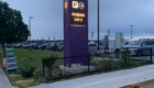 Amber LED parking pylon sign marking Lot C at the Cross Border Xpress terminal