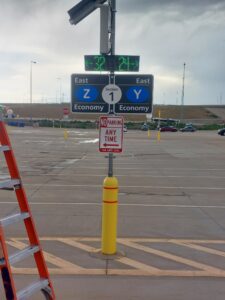 Solar-powered LED parking count sign showing available spaces in the East Economy lot at Denver International Airport